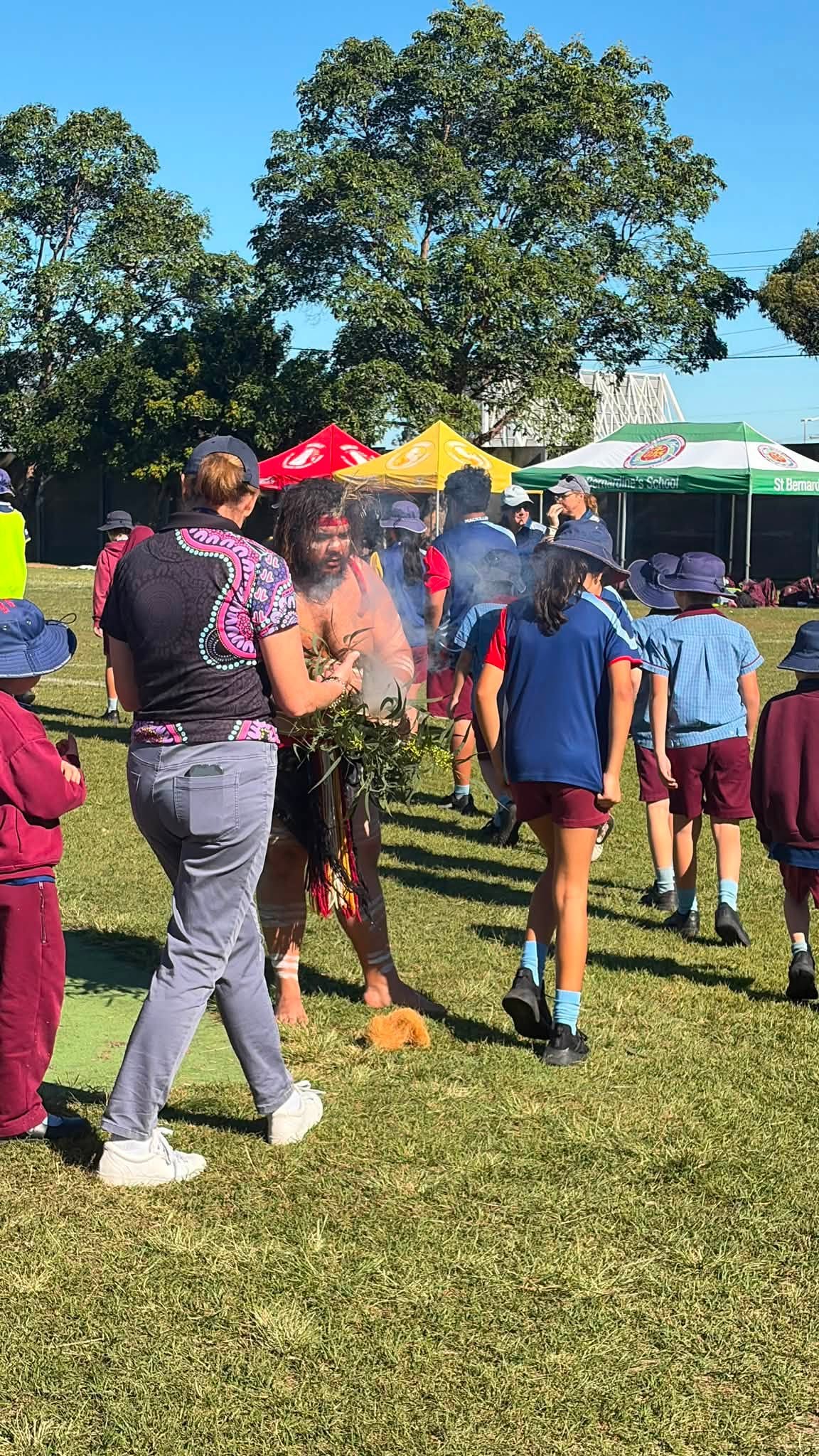 Student's attending Smoking Ceremony before game day begins.