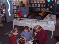 Students participating in an activity in the library
